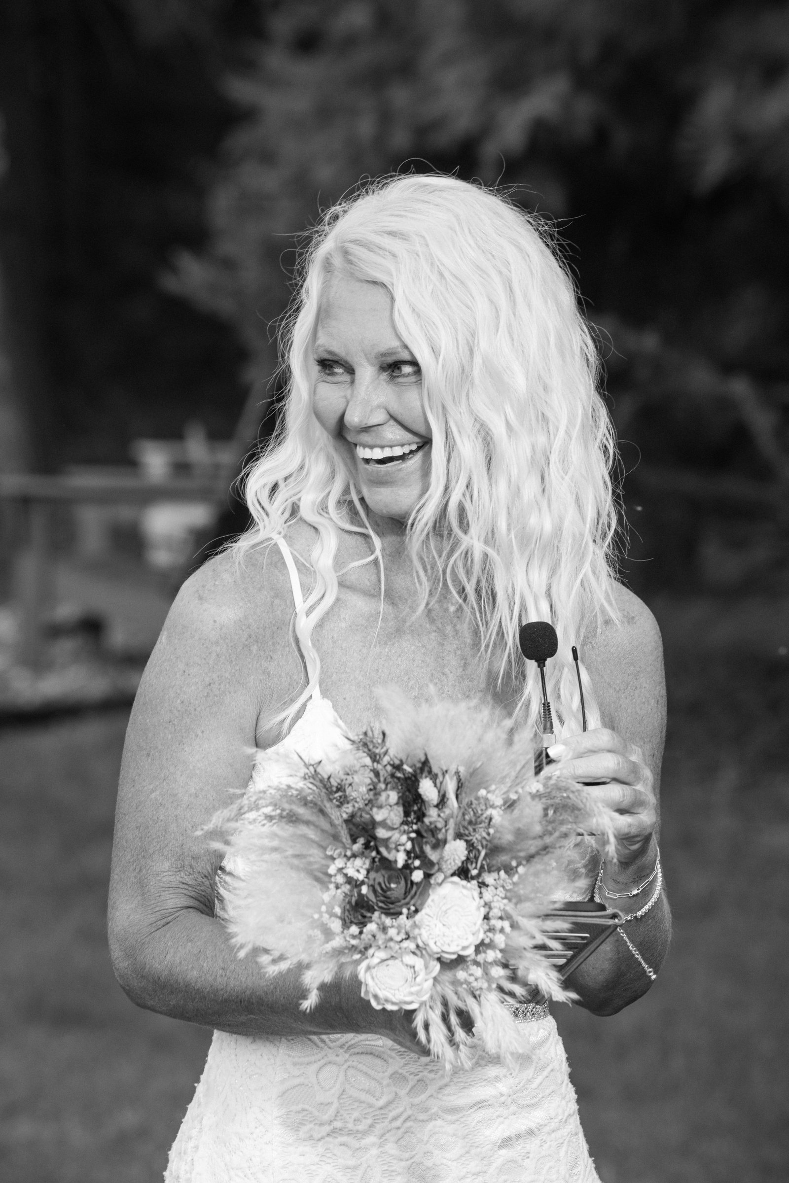 Bride laughing during ceremony, Minneapolis wedding photography