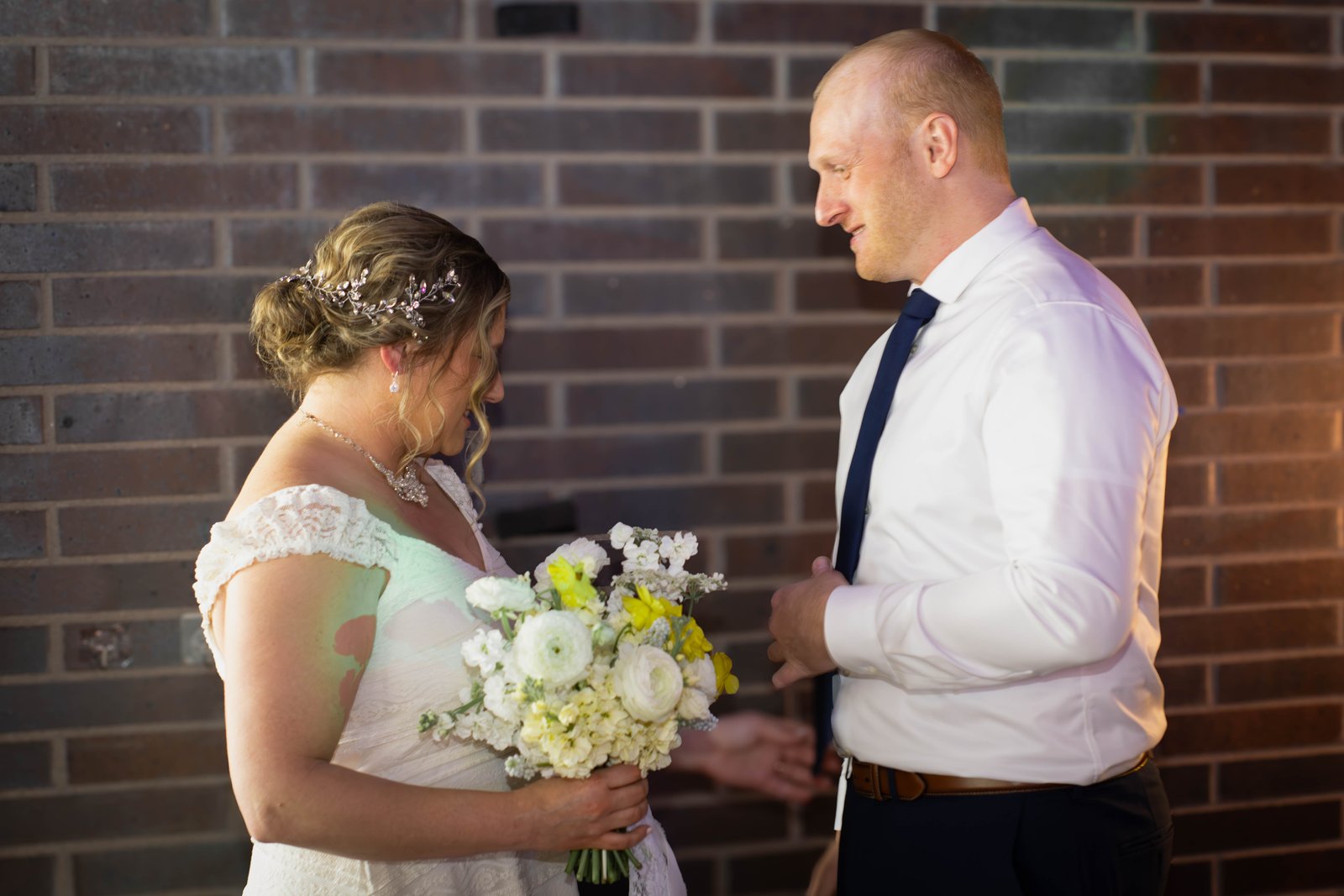 Bride and groom sharing a quiet moment - documentary wedding photography Minneapolis